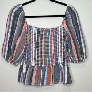 Women’s multi color smocked peplum Sz Small‎